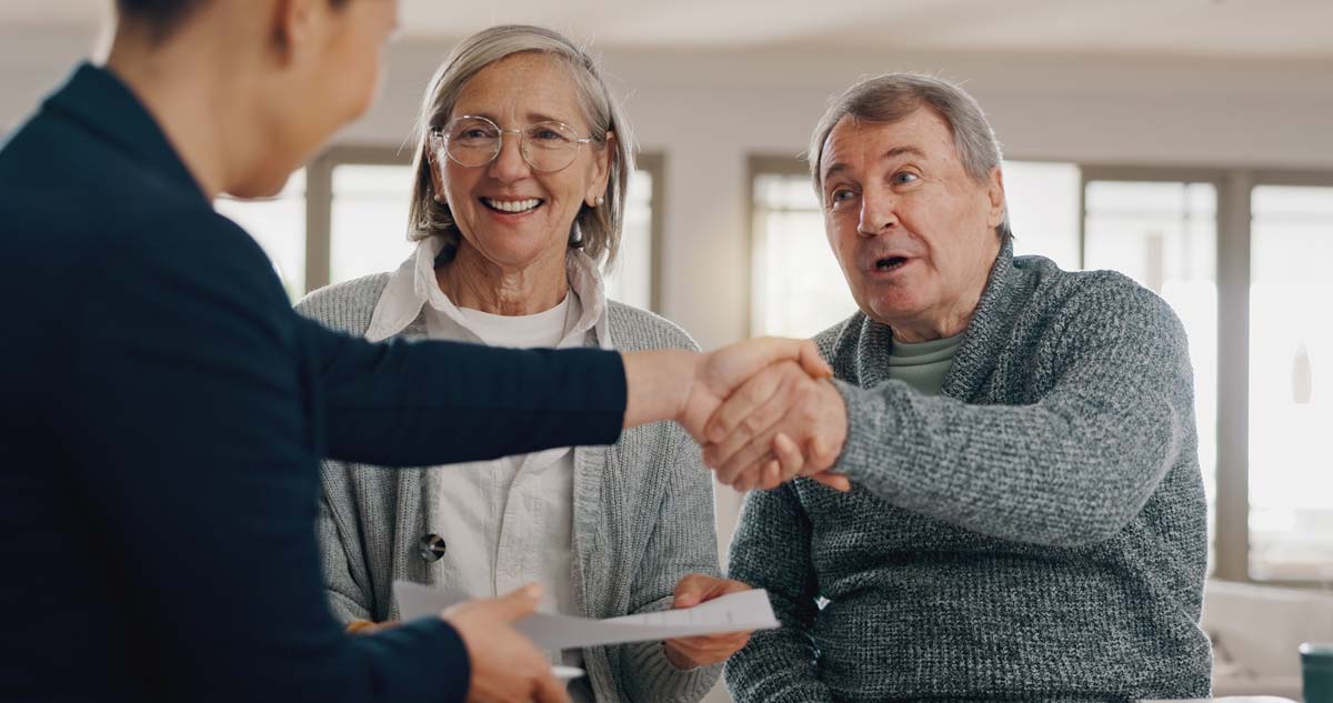 Couple working with an annuity expert to choose the best immediate annuity for their retirement needs.
